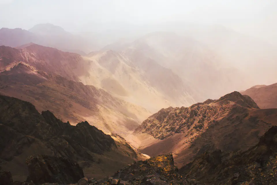 Light falling through haze over the ridges of the High Atlas near Toubkal