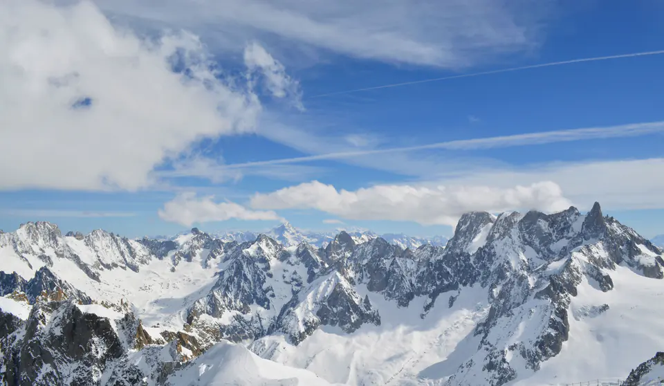 Jagged granite peaks and glaciers of the Mont Blanc massif above Chamonix