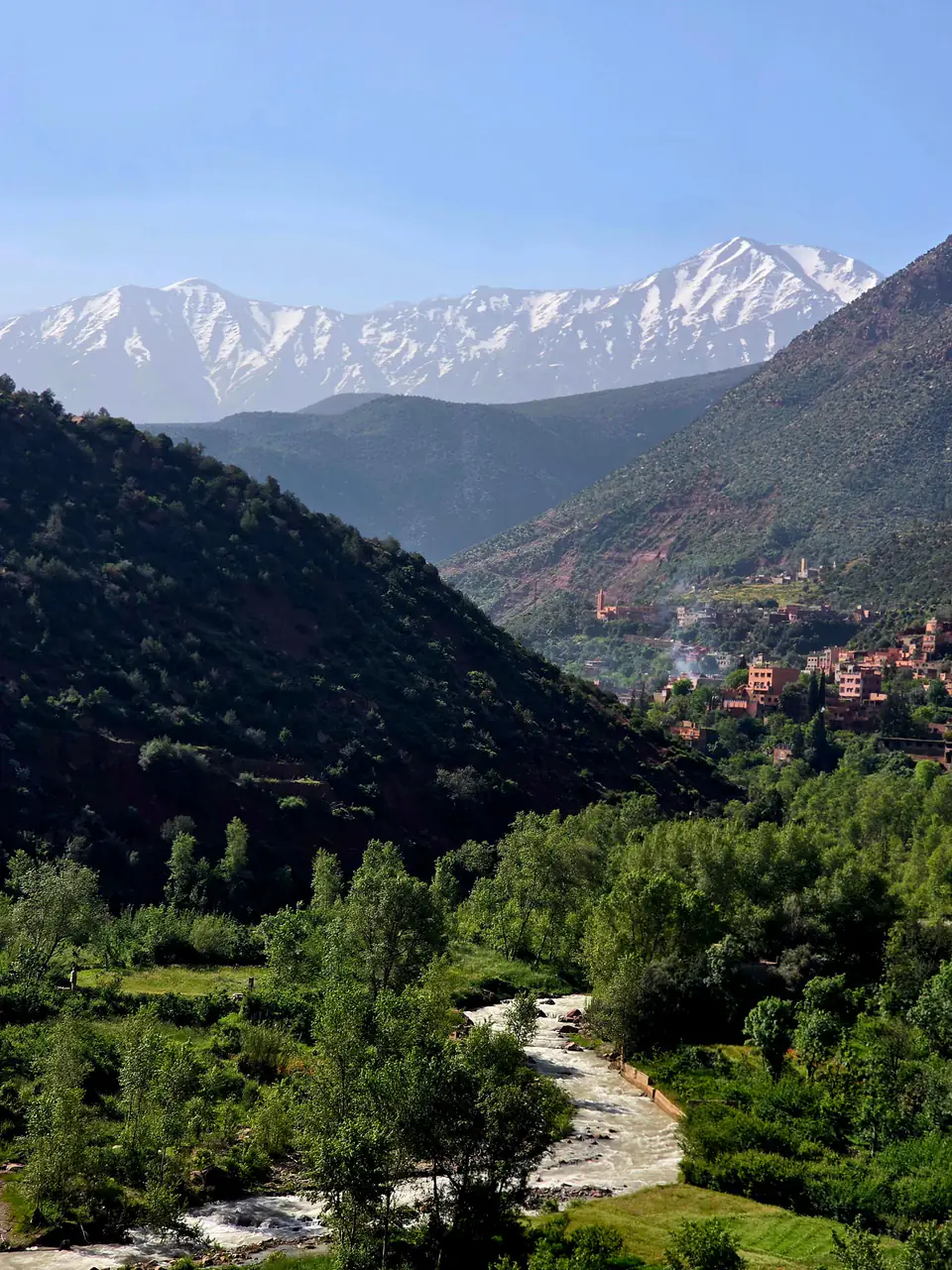The Ourika valley below the snow-capped Atlas, its river and villages seen from a height