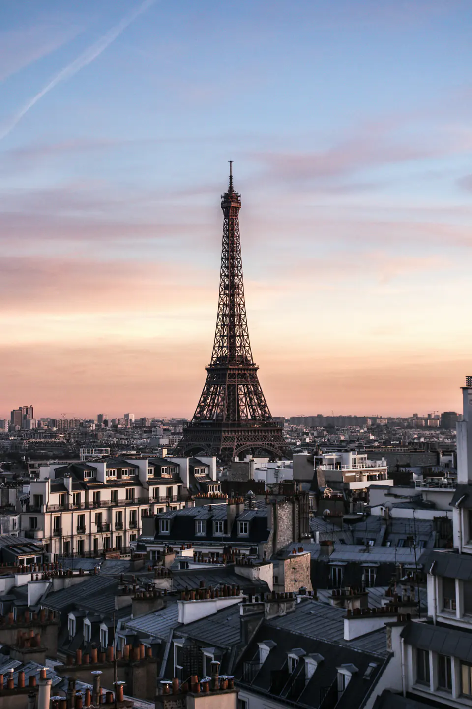 The Eiffel Tower above the rooftops of Paris
