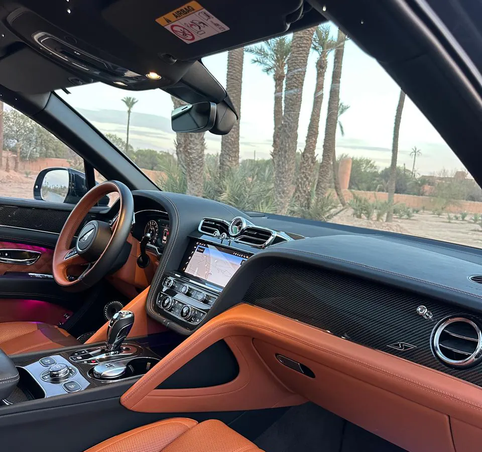 Dashboard and front seats of the Bentley Bentayga in tan leather