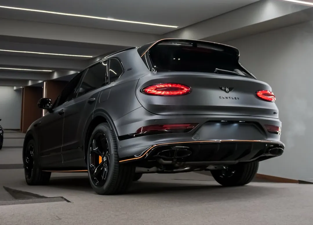 Matt grey Bentley Bentayga, rear three-quarter view